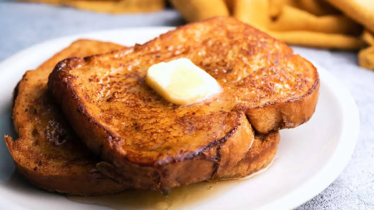 Rich french toast on a serving plate
