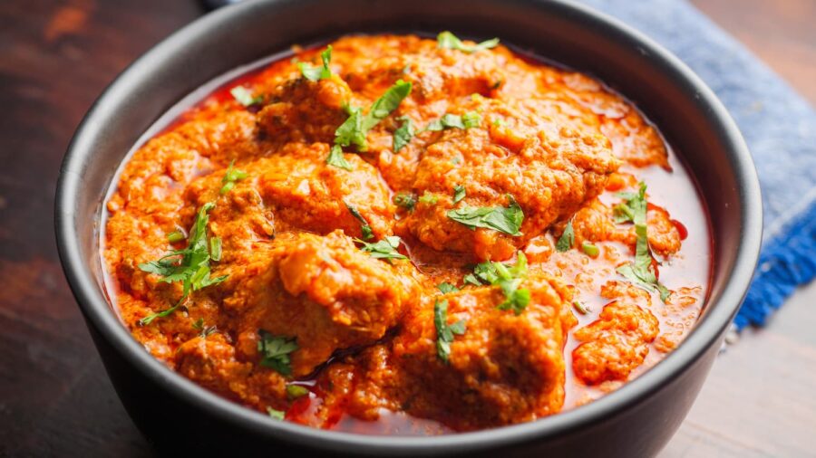 Chicken Tikka Masala in a black bowl