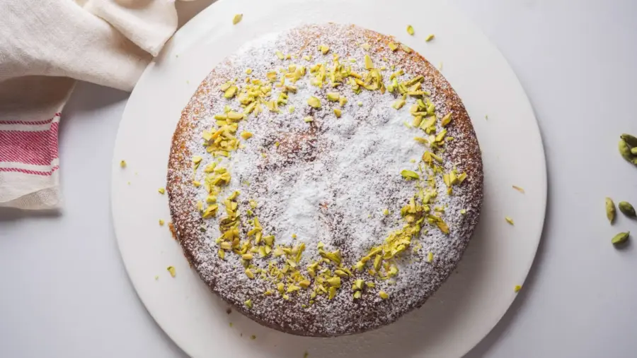 Cardamom Cake on a serving cake stand