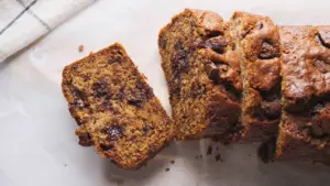 Chocolate Chunk Banana Bread slices on a servinfg board