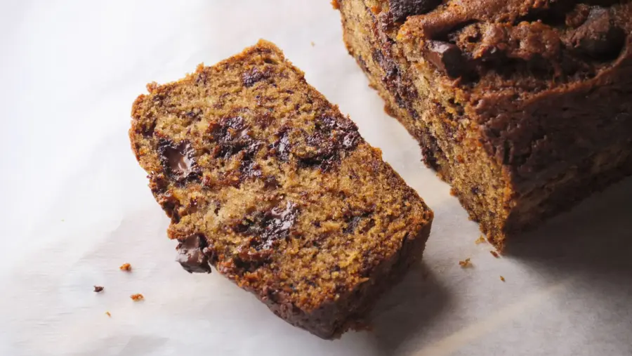 Chocolate Chunk Banana Bread slice on serving area