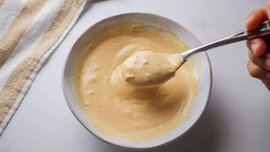 Healthy Big Mac Sauce in a serving bowl with a spoon