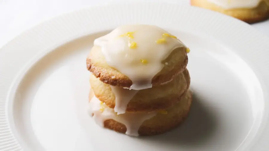 Glazed Lemon Cookies are placed in a serving plate