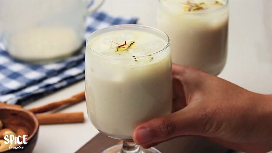 Thandai, masala milk,or badam milk is served in glasswares