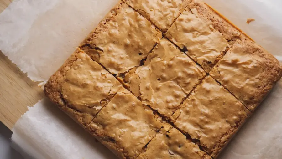Brown Butter Blondies are placed on a serving board