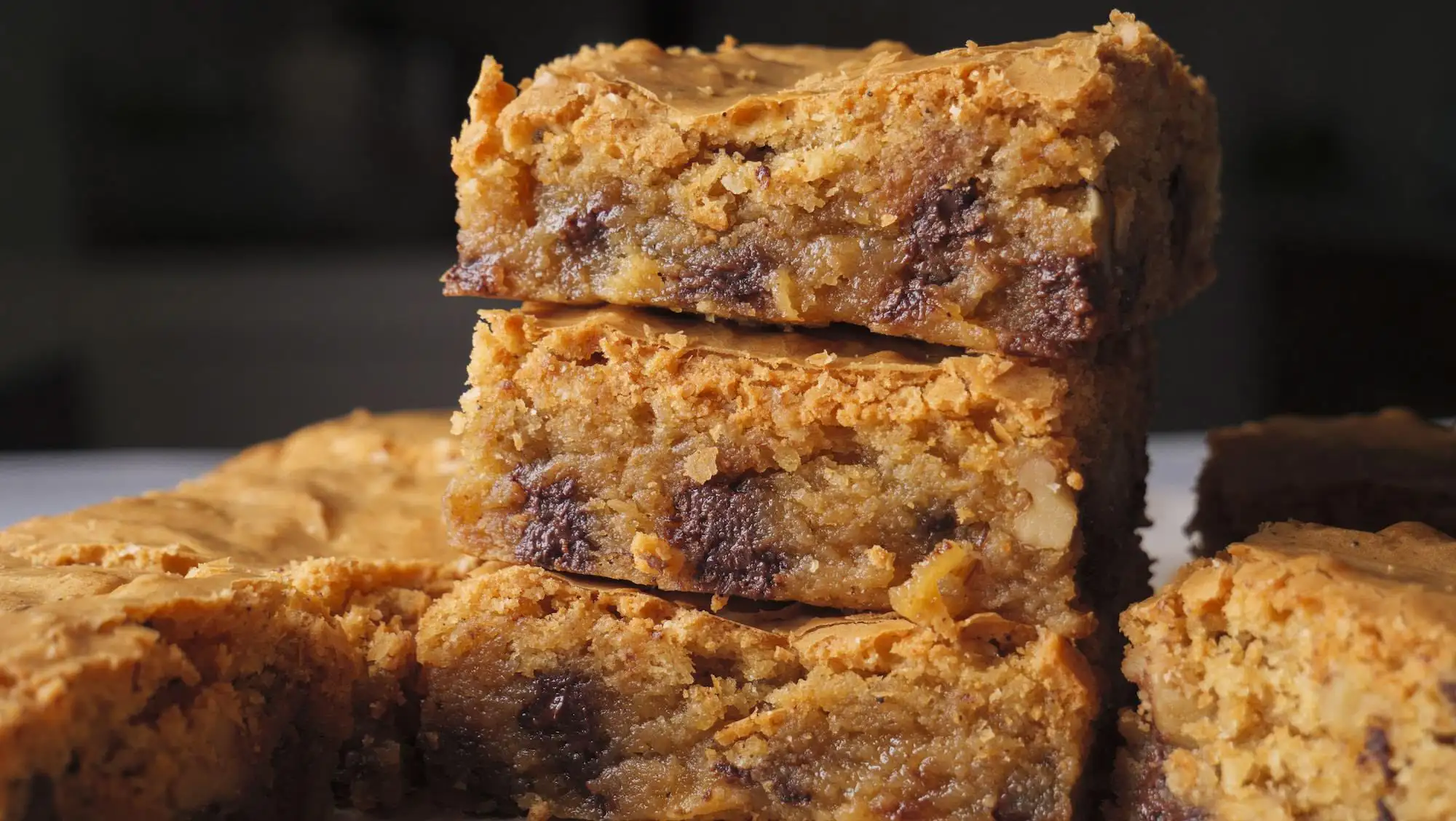 Brown Butter Blondies are placed on a serving board