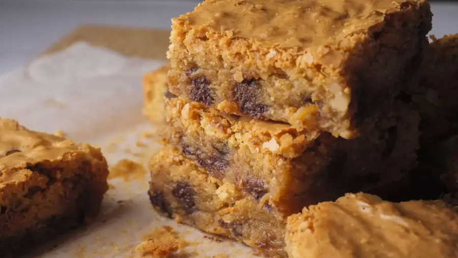 Brown Butter Blondies are placed on a serving board