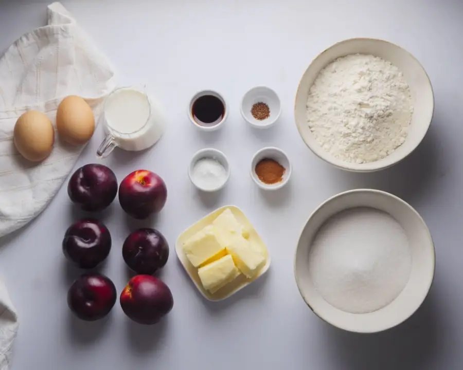 Plum Cake Ingredients placed on a kitchen counter
