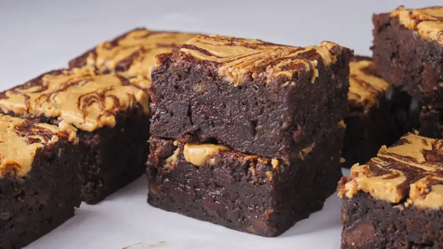 Peanut Butter Banana Brownies sitting on a serving board