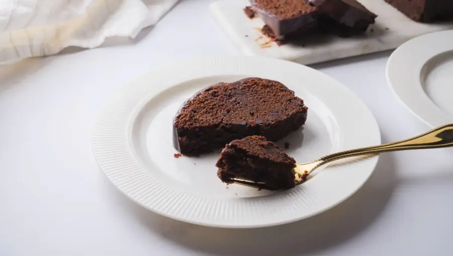 Chocolate Loaf Cake served on the serving plates with fork
