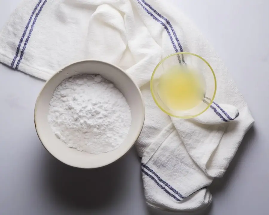 Lemon Glaze Recipe Ingredients on a white kitchen counter