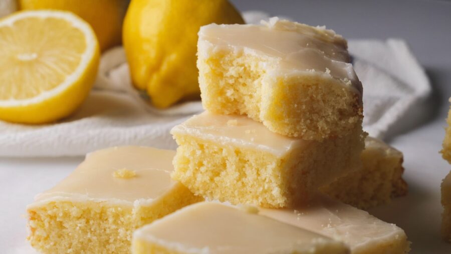 Lemon Brownie bars with icing, freshly baked and ready to serve.
