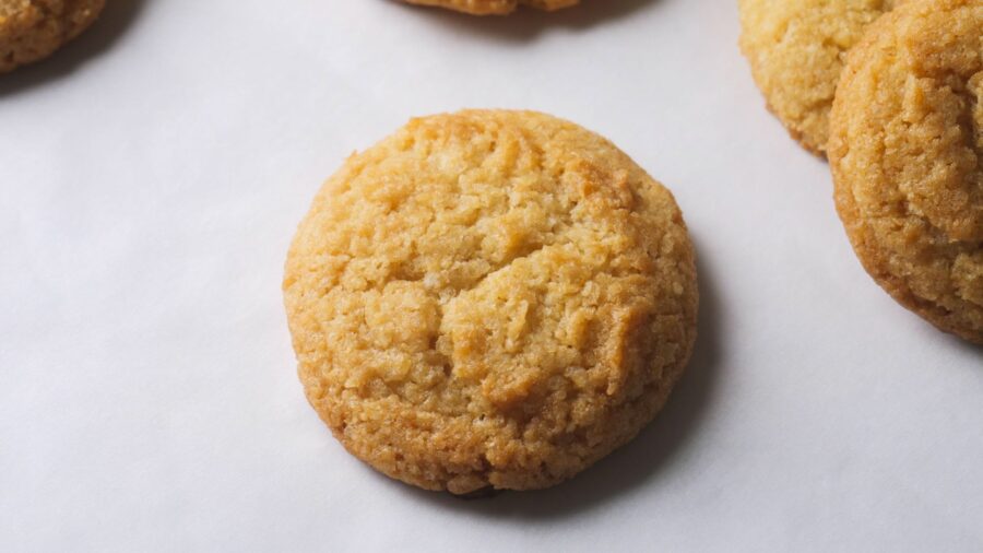 Chewy Coconut Cookies on a white paper background.