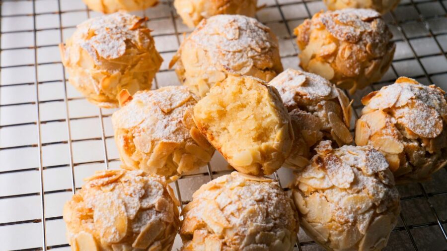 Classic Italian Almond cookies are cooling on a wire rack.