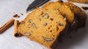 Sweet potato bread slices with walnuts and cinnamon sticks
