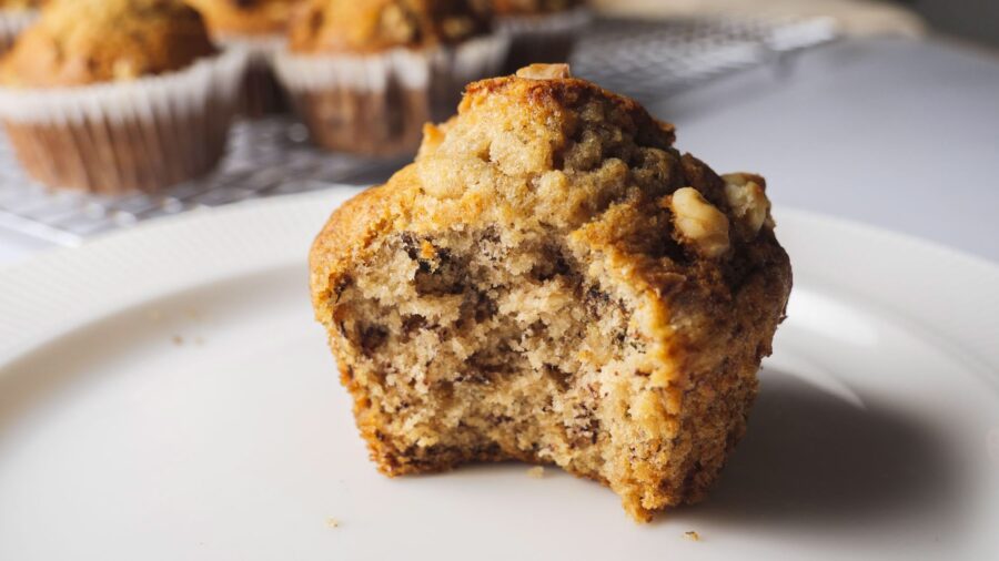 Banana muffins with a bite taken out.