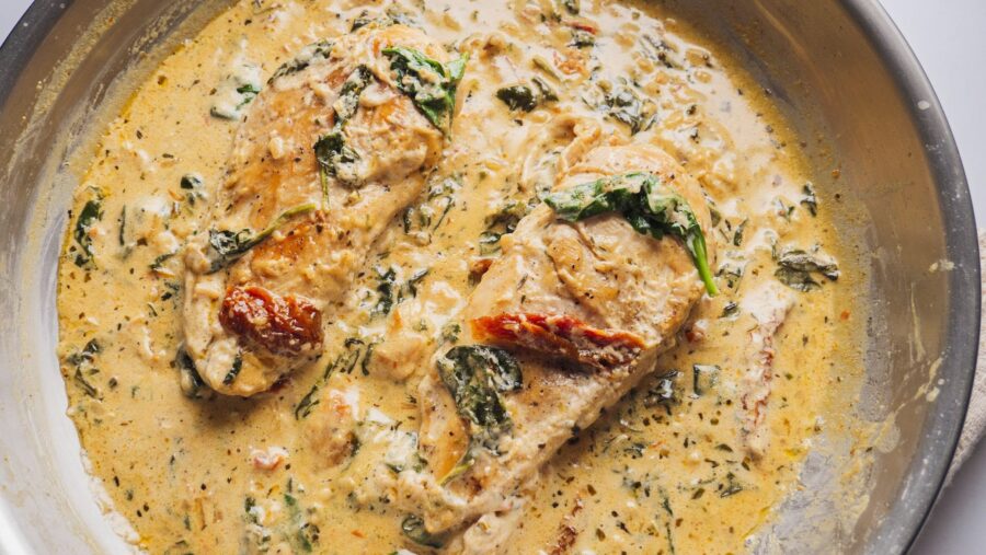 Creamy Tuscan chicken with spinach and sun-dried tomatoes.
