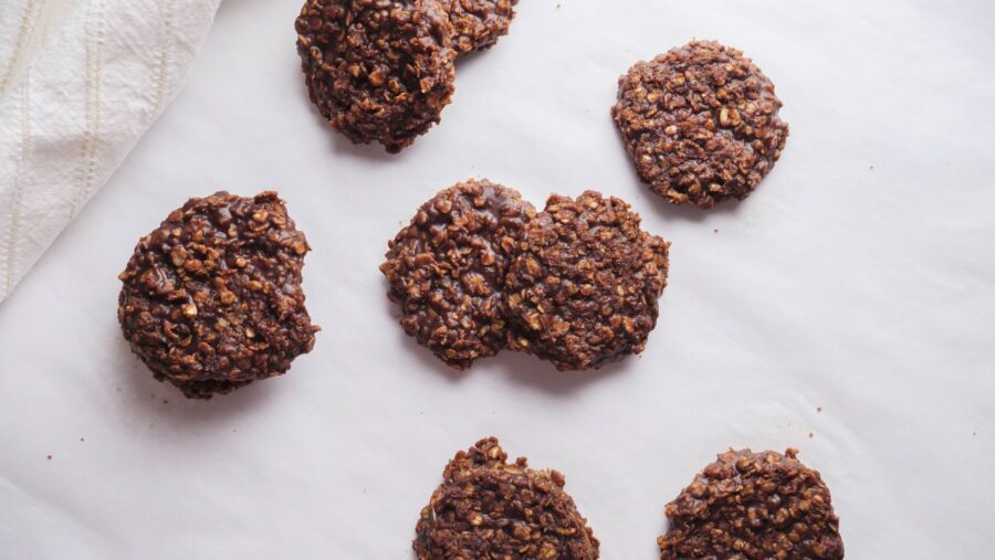 No-bake chocolate oatmeal cookies on a white surface.