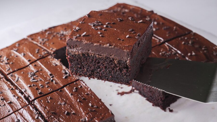 Decadent chocolate cake slice with rich frosting.
