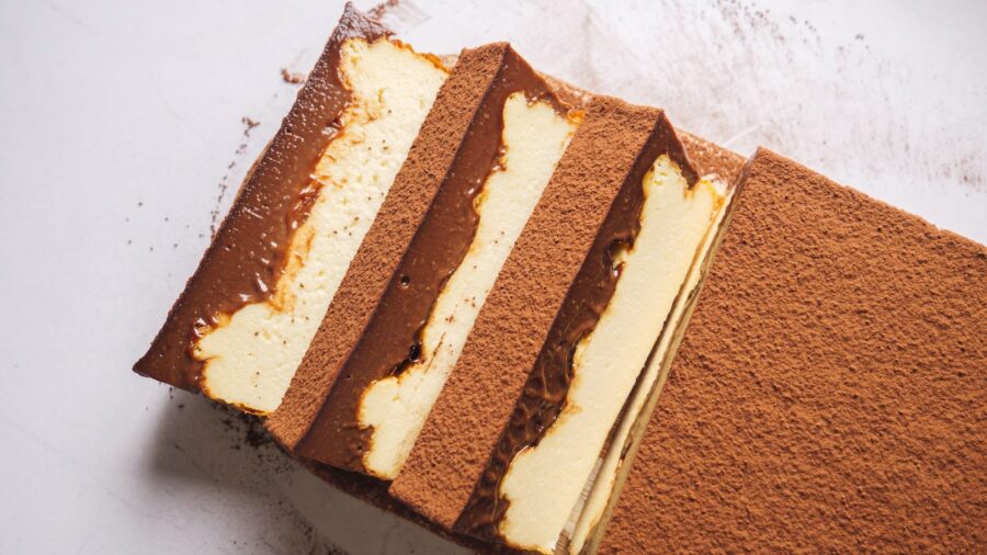 Iceberg Basque Cheesecake slice placed on a white board