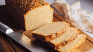 Red Lentil Bread on a cutting board with some slices
