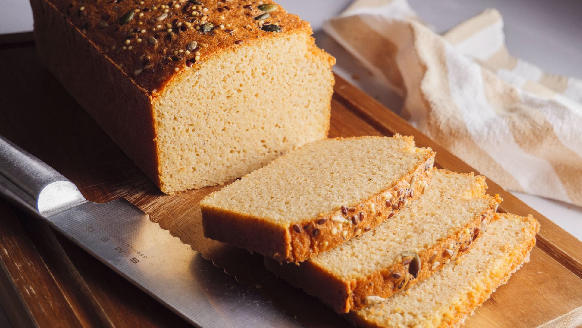Red Lentil Bread on a cutting board with some slices