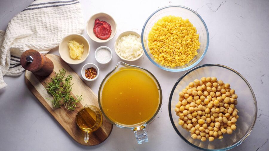 ingredients For Pasta e Ceci Recipe placing on a white kitchen counter